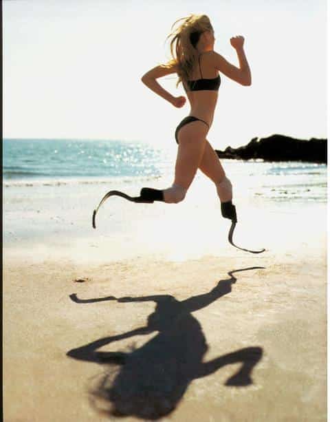 woman without legs running on the beach